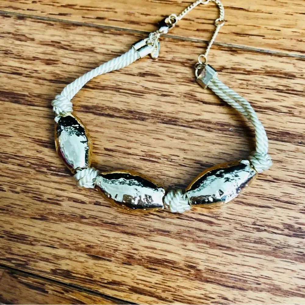 Anthropologie gold toned